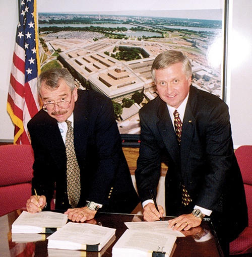 Walter Evey signing the contract for renovation of Wedges 2-5 of the Pentagon