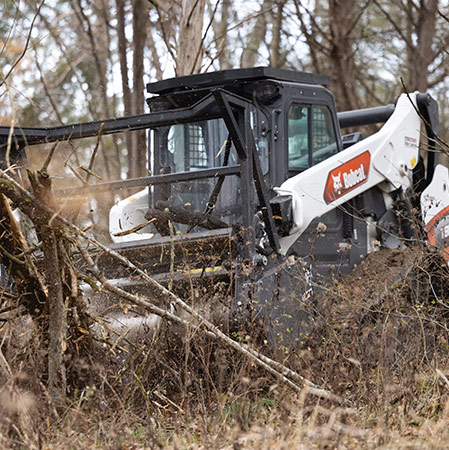 Bobcat track loader with drum mulcher
