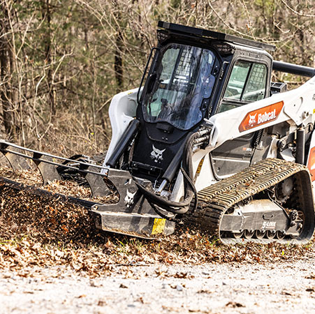 Bobcat T86 compact track loader with brush cutter