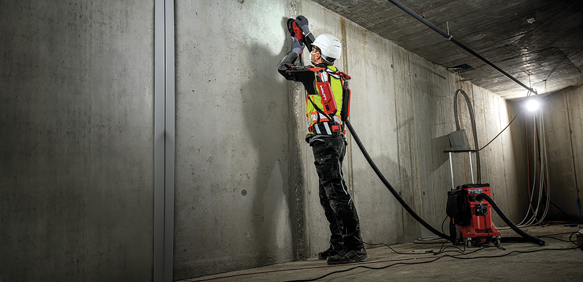 Construction worker using exoskeleton