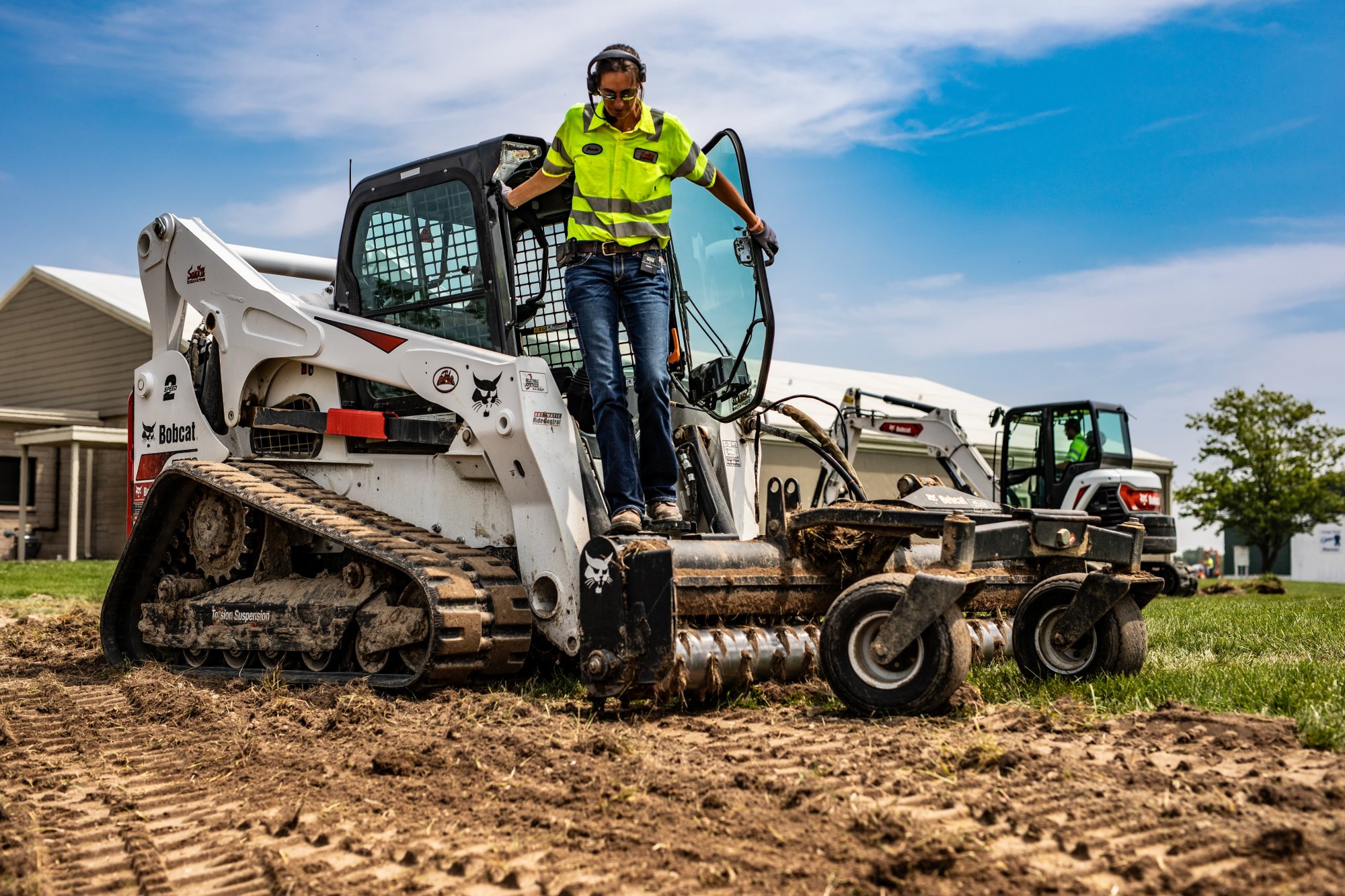 Jessie Hamilton in Bobcat T870 compact track loader