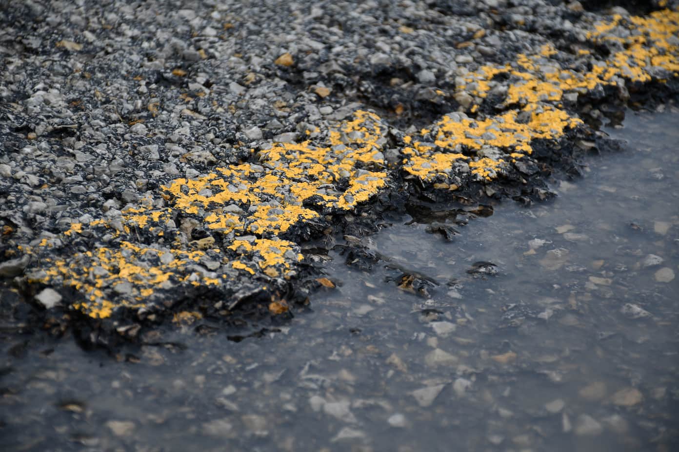 crumbling highway pavement