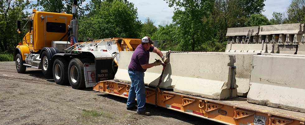 Worker checking trailer
