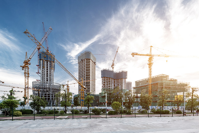 construction cranes on work site