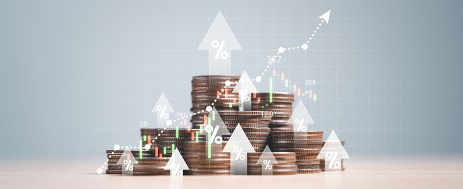 Stacks of coins with upward arrows surrounding the money
