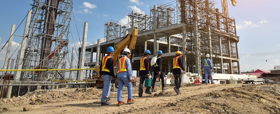 Construction team walks the jobite