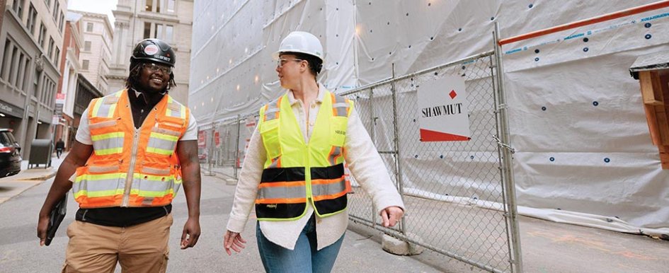 Two workers from Shawmut Design & Construction