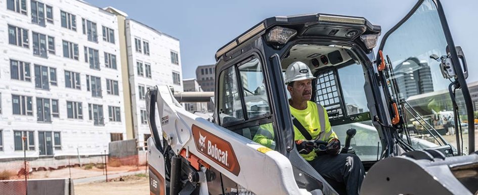 Operator in a Bobcat machine/ Bobcat
