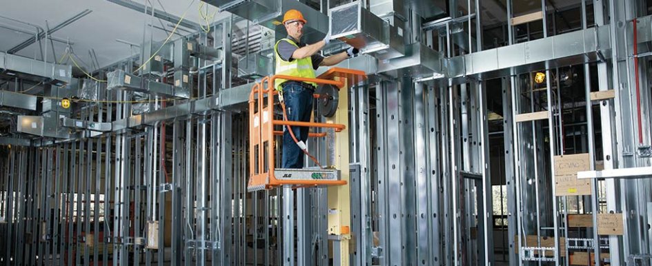 construction worker in lift 