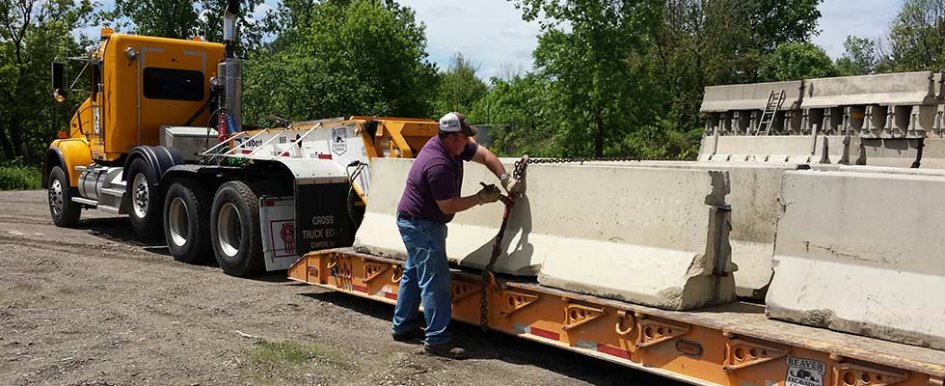 Worker checking trailer