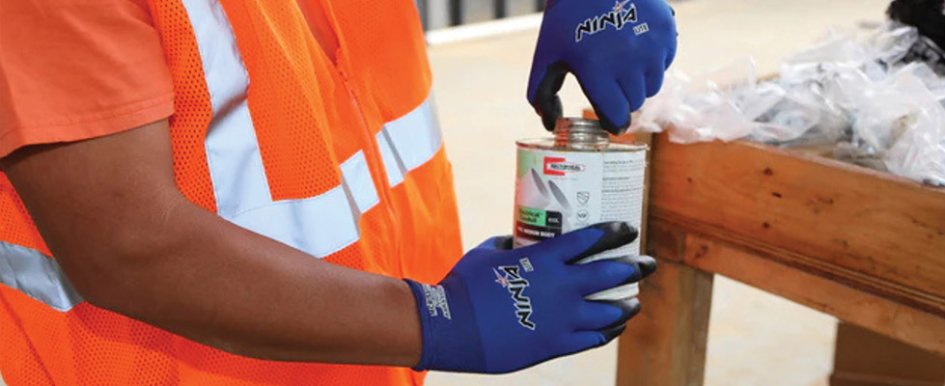 Worker wearing MCR Safety gloves