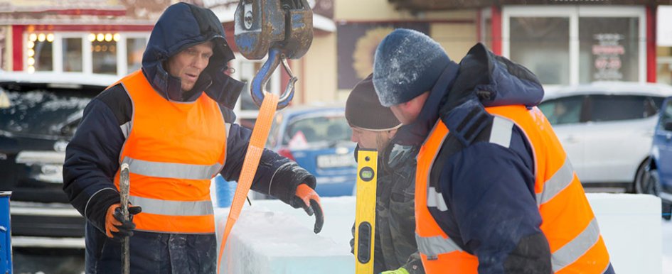 Construction workers in snow