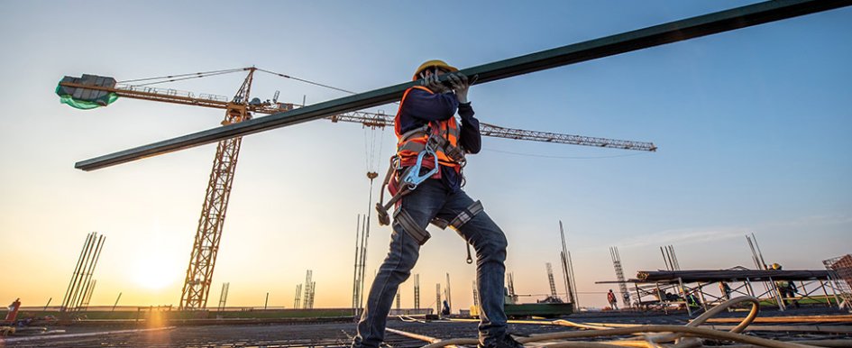 Image of worker on jobsite/Adobe stock