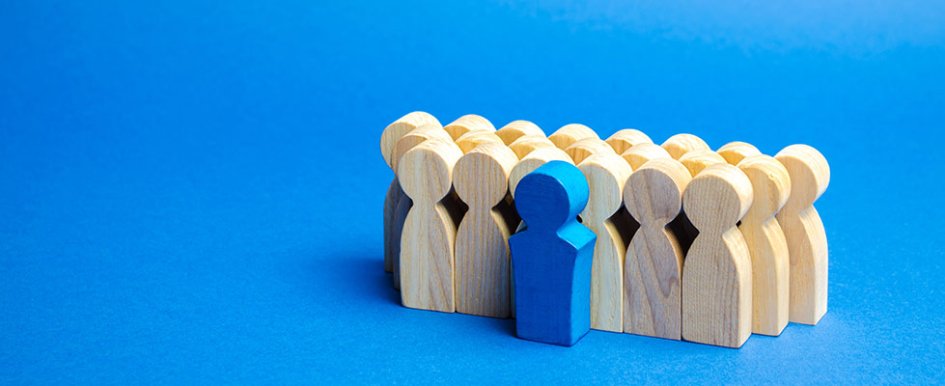 One figurine standing out from the others to illustrate how top talent is set apart 