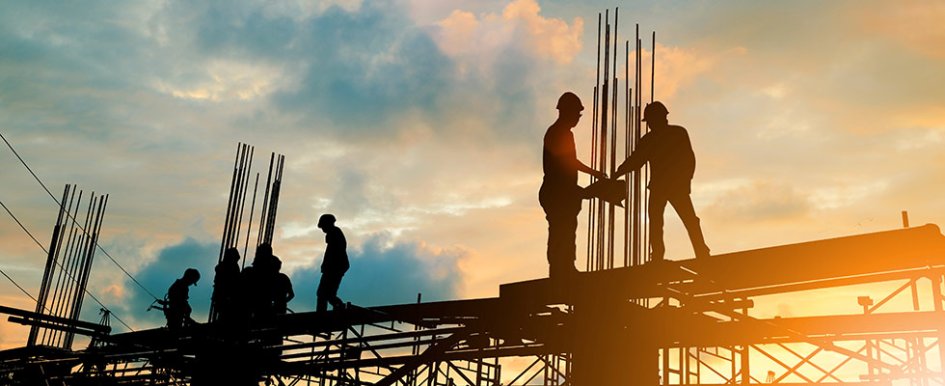 Construction workers on scaffolding