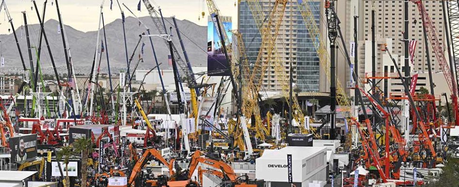 Conexpo 2023: Cranes in front of Las Vegas hotels, mountains in the background