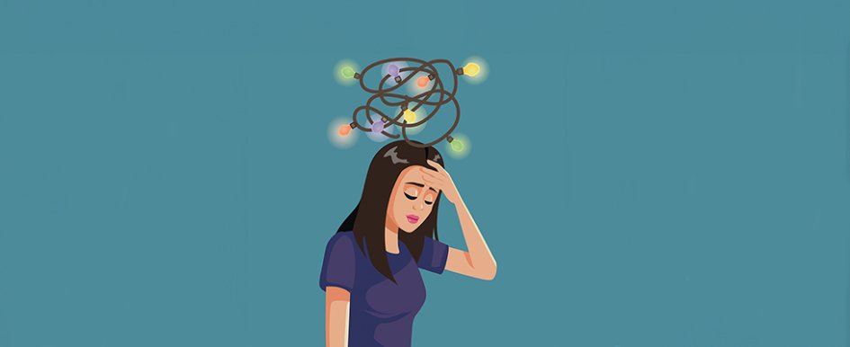 stressed woman with holiday lights over head/Adobe Stock