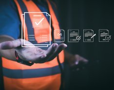 construction worker with safety program symbols