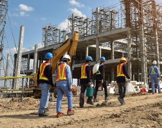 Construction team walks the jobite