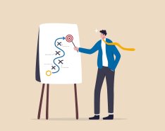 Businessman presenting strategy roadmap to target