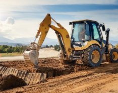 backhoe in use for dirt work