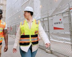 Two workers from Shawmut Design & Construction 