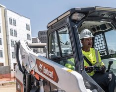Operator in a Bobcat machine/ Bobcat
