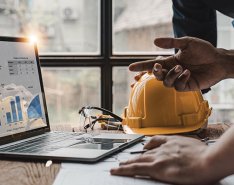 Construction workers using technology