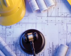 gavel and hard hat to show legal insights in construction