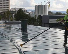 Construction worker in fall protection gear courtesy of Diversified Fall Protection