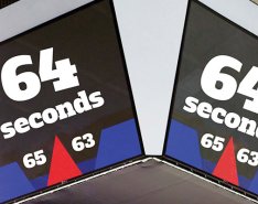 Scoreboard showing 65-63 basketball score with 64 seconds on the clock