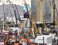 Conexpo 2023: Cranes in front of Las Vegas hotels, mountains in the background 
