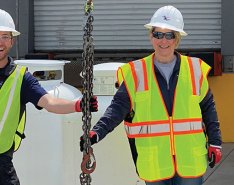 Three construction workers smiling 