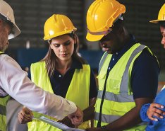 Group of construction workers/Adobe Stock