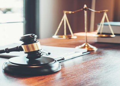 Gavel and scales of justice/Adobe Stock 