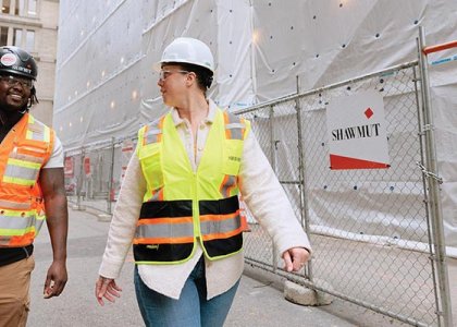 Two workers from Shawmut Design & Construction 