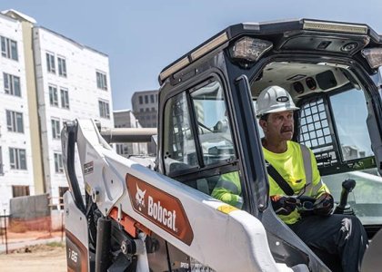 Operator in a Bobcat machine/ Bobcat