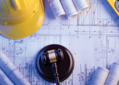 gavel and hard hat to show legal insights in construction
