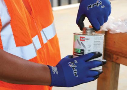 Worker wearing MCR Safety gloves