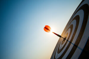 Arrow hitting a target