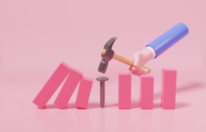 Hammer reinforcing a row of pink blocks.