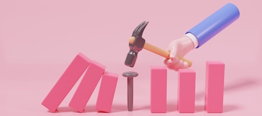 Hammer reinforcing a row of pink blocks.