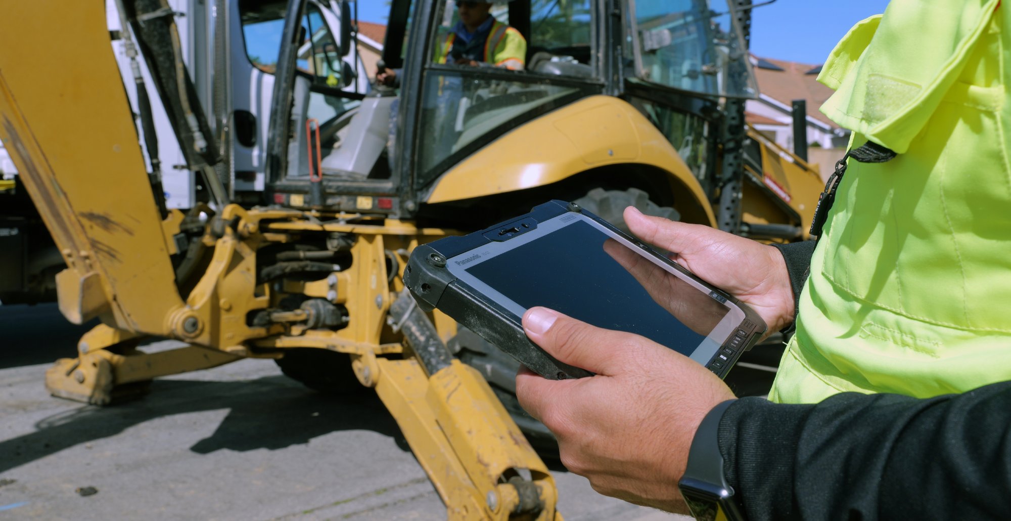 Construction worker using Panasonic Connect rugged computing device
