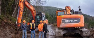 Workers from R4 Contractors around Develon equipment