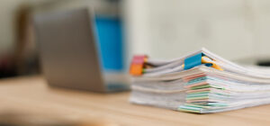 Stack of paperwork on a desk