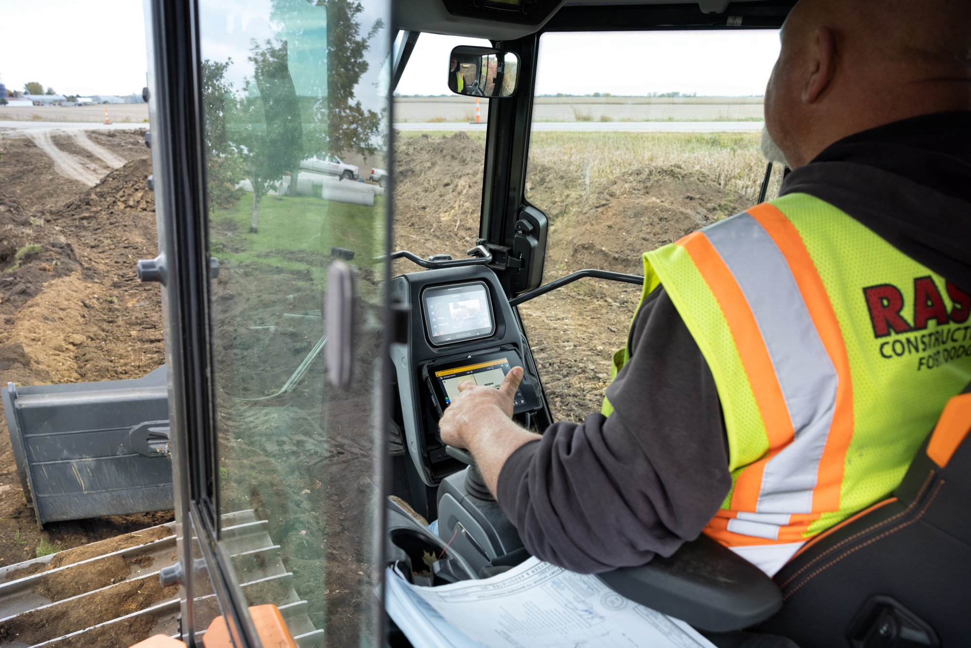 Construction operator using excavator control system