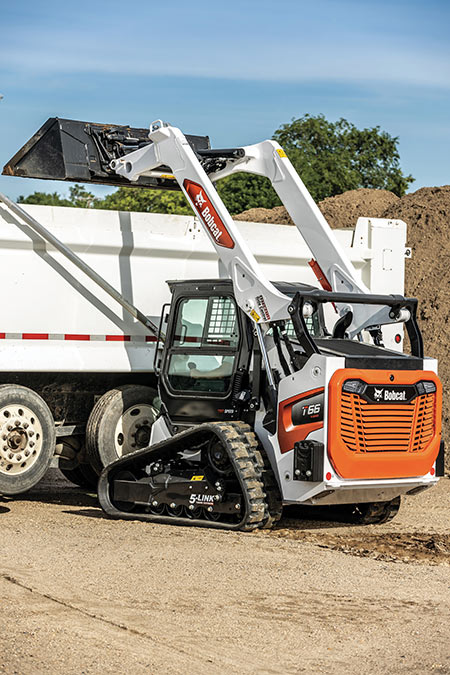 Bobcat T66 compact track loader loading truck