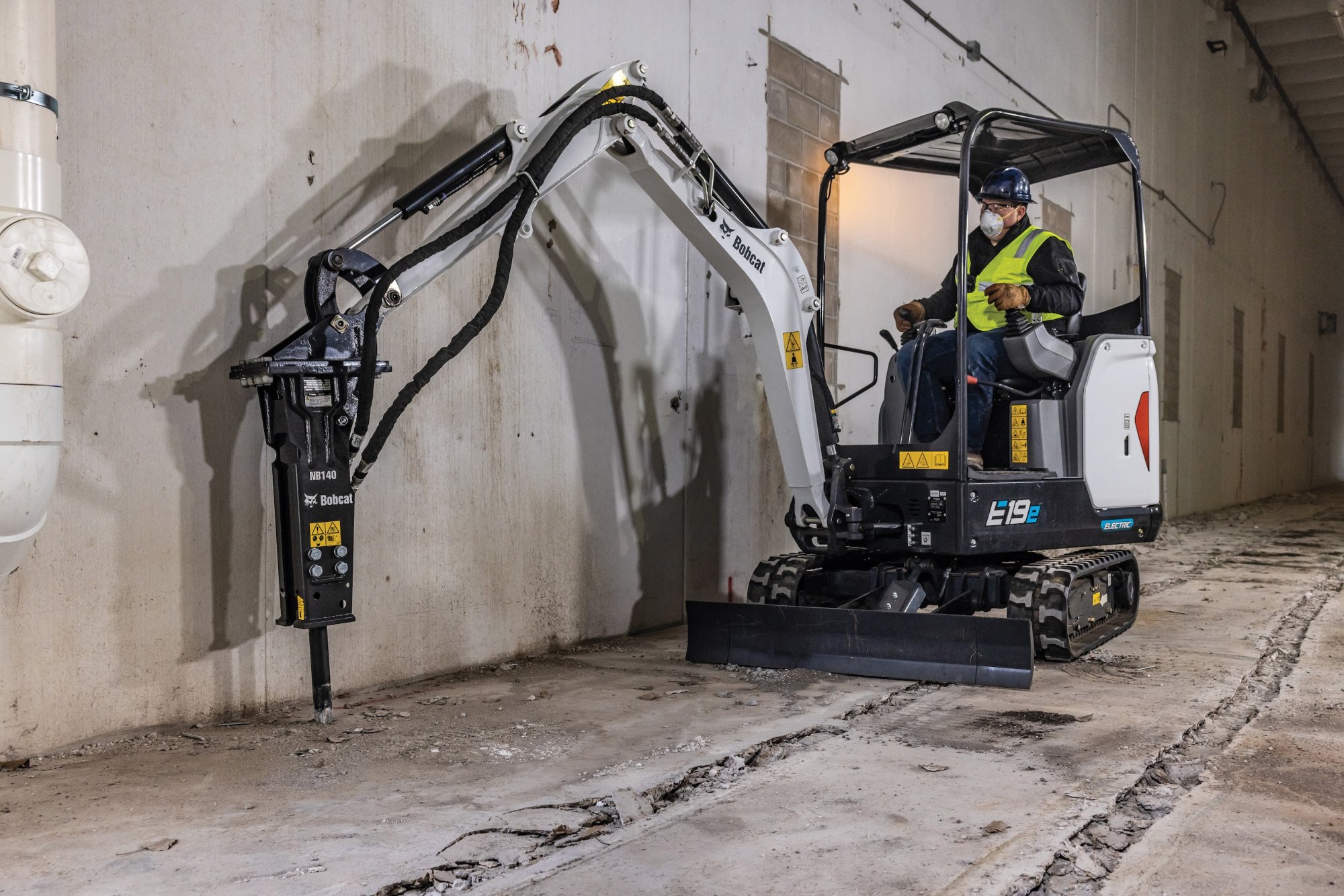 Bobcat E19e battery electric compact excavator with nitrogen breaker