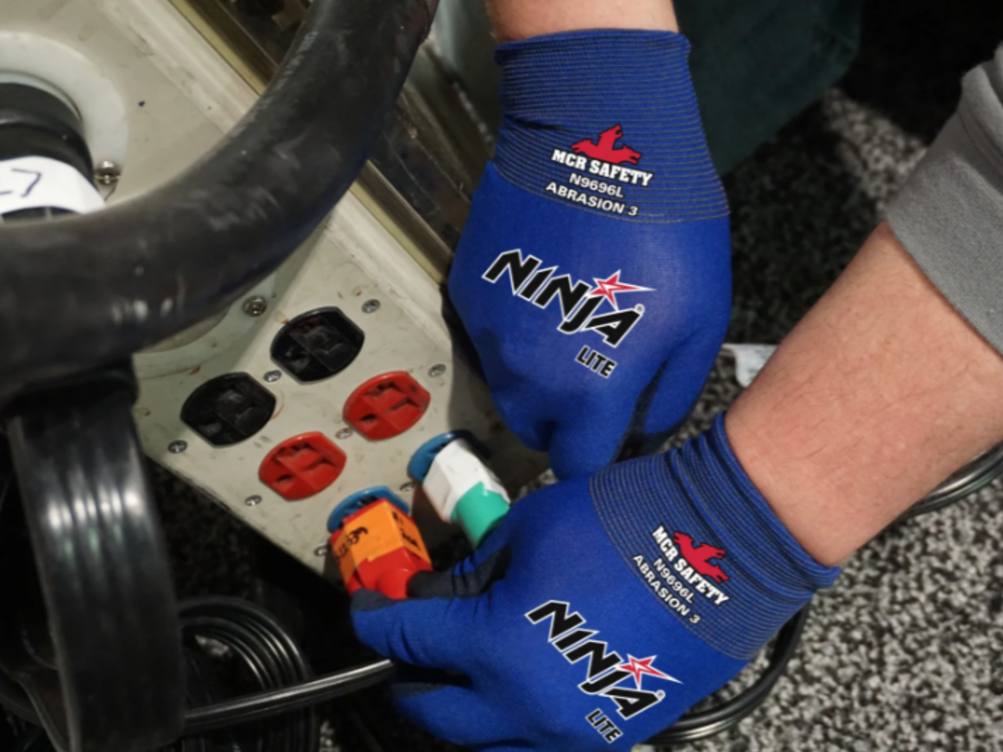 Workers wearing MCR Safety Ninja Lite gloves