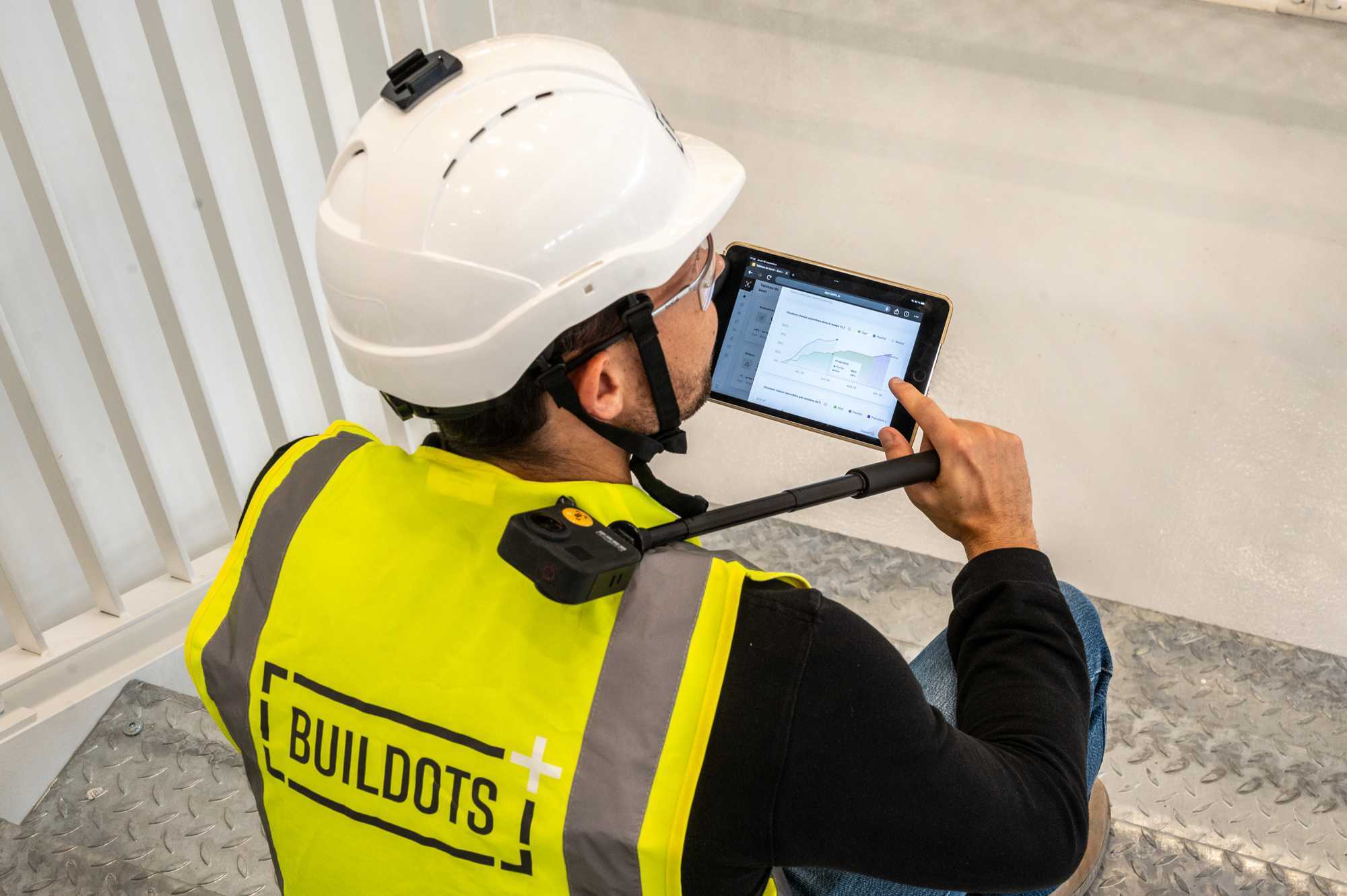 Construction worker using Buildots software